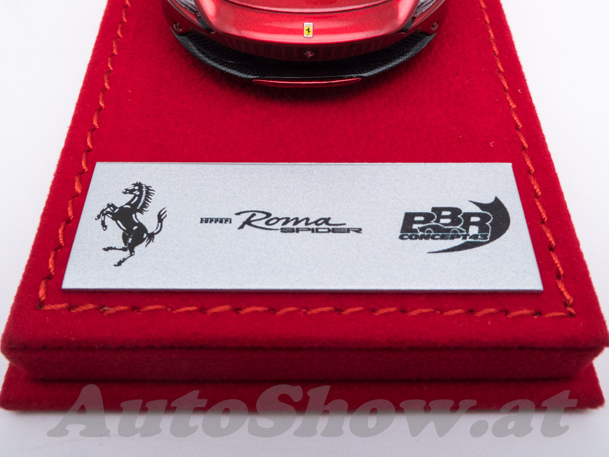 Ferrari Roma Spider, rosso magma metallic, on high red alcantara design leather base
